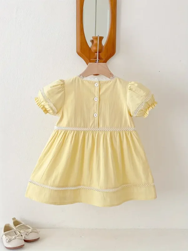 vestido amarillo bordado floral