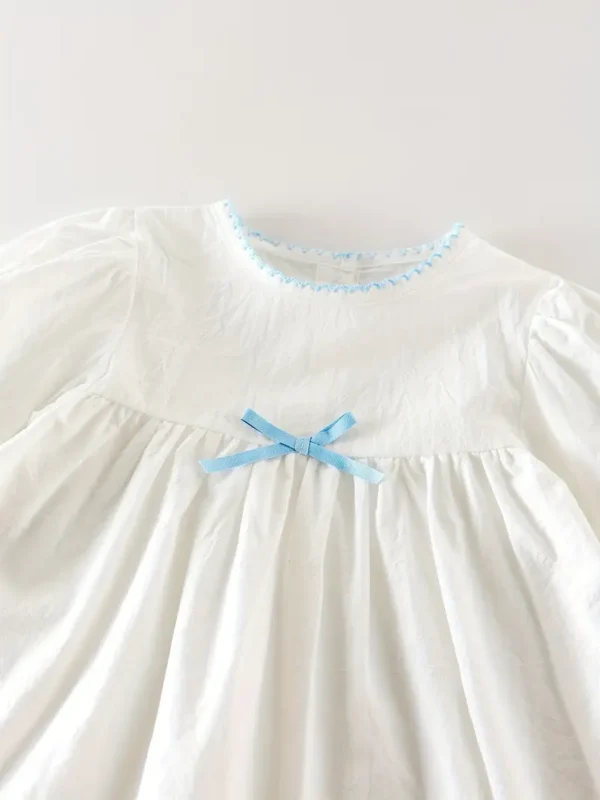 vestido manga larga blanco con detalles azul