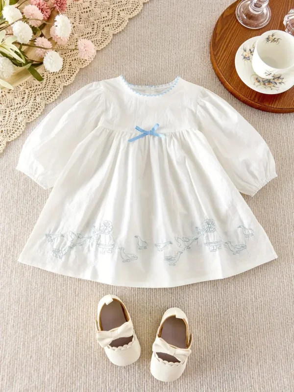 vestido manga larga blanco con detalles azul